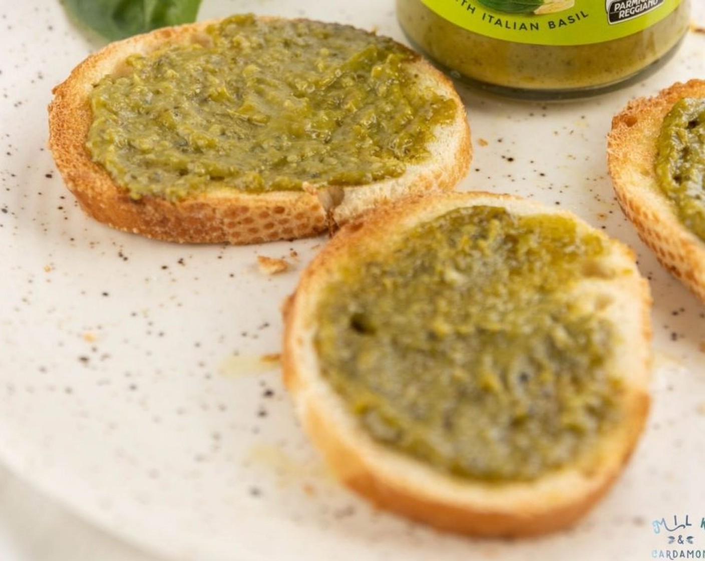 step 5 Spread a thin layer of Basil Pesto (2 Tbsp) onto your crostini. Top with Mozzarella Cheese (2/3 cup) and mushrooms.