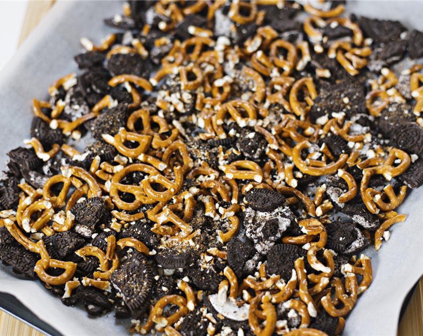 step 4 Lightly crush the Salted Pretzels (1 cup) and evenly spread on top of the crushed Oreos.