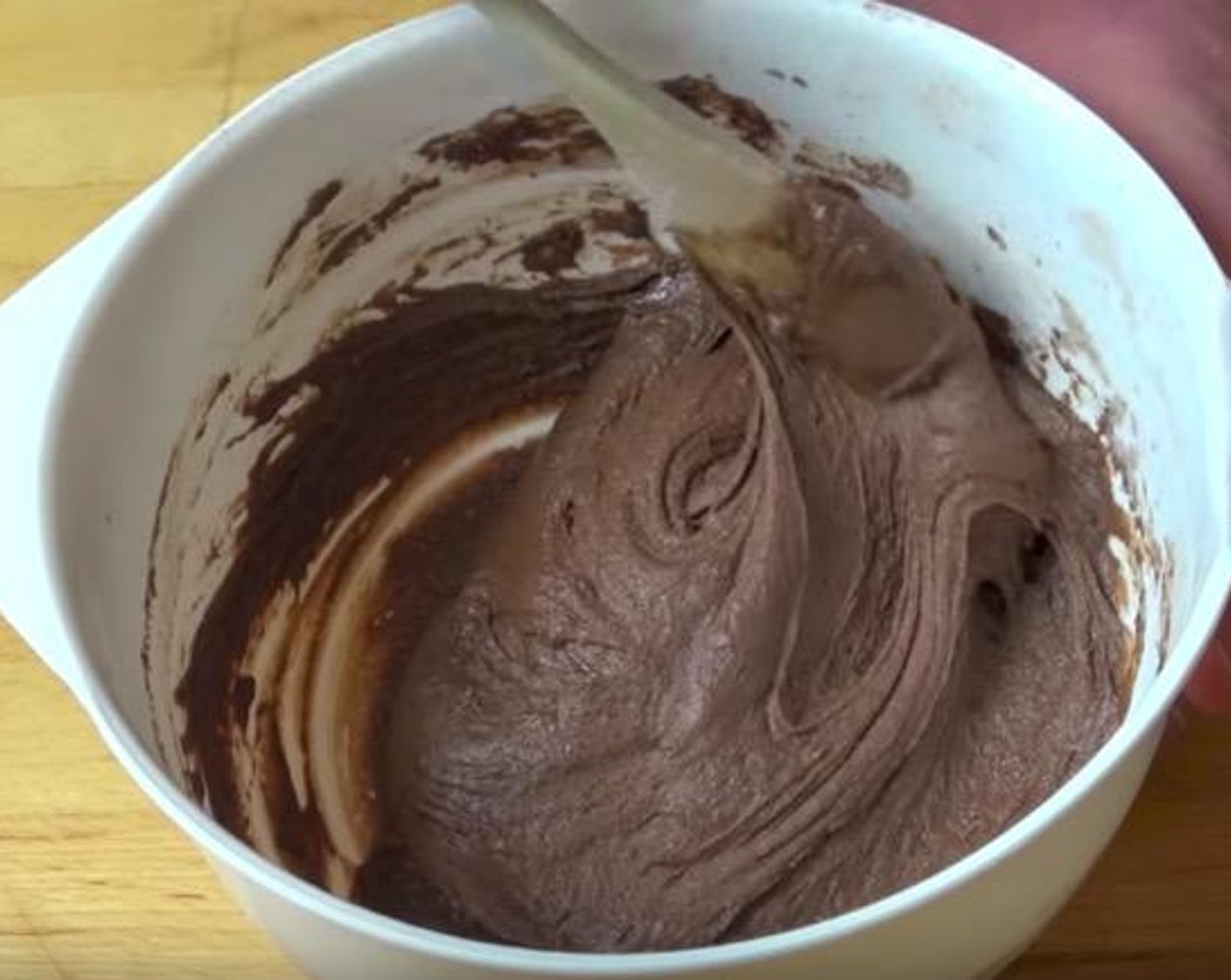 step 1 Put All-Purpose Flour (1 cup), Caster Sugar (1/3 cup), Baking Powder (1 tsp), Unsweetened Cocoa Powder (2 Tbsp) into a mixing bowl and mix it together. Make a well in the center and add Milk (1/4 cup), Butter (3 Tbsp), Egg (1) mix together until smooth.