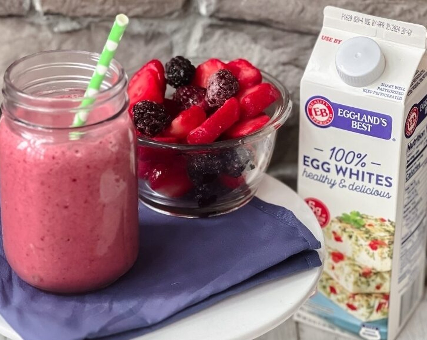 step 1 In a blender, combine Eggland's Best Liquid Egg Whites (1/2 cup), Banana (1/2), Frozen Mixed Berries (1 cup), Orange Juice (1/2 cup), and blend until smooth.