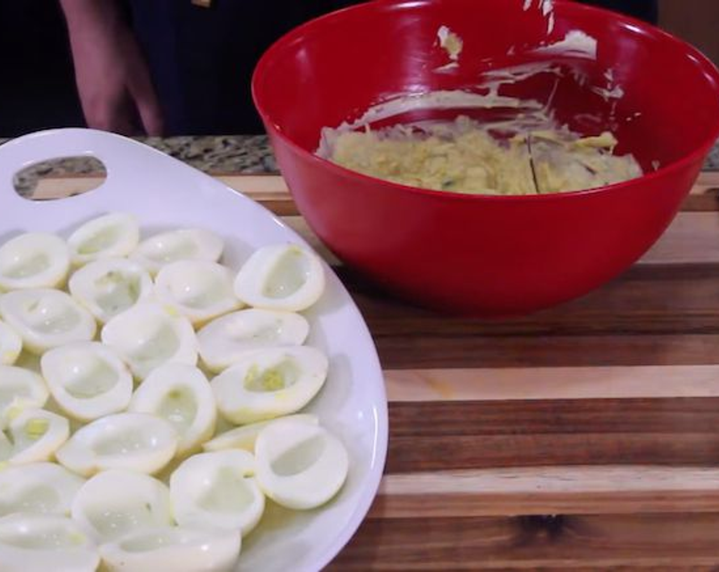 step 4 To the bowl with the yolks, add Mayonnaise (1/2 cup), half of the diced Bacon (1 slice),  Apple Cider Vinegar (2 tsp), Spicy Brown Mustard (2 tsp), Chili Powder (1/2 tsp), Fresh Chives (2 Tbsp), Salt (1/4 tsp), Freshly Ground Black Pepper (to taste) and Hot Sauce (to taste). Using a fork, mash the mixture together and taste for seasoning. Add more salt if needed.