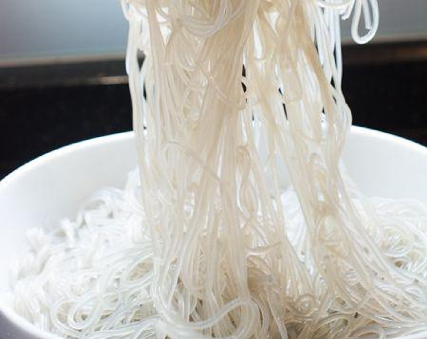 step 3 Noodles: Bring a large pot of water to a boil. Boil the Sweet Potato Starch Noodles (1 lb) for about 7 minutes or until al-dente. Pour into a colandar and thoroughly rinse in cold water. When all of the water has drained, pour Sesame Oil (1 Tbsp) over the noodles then toss till all of the noodles are coated.