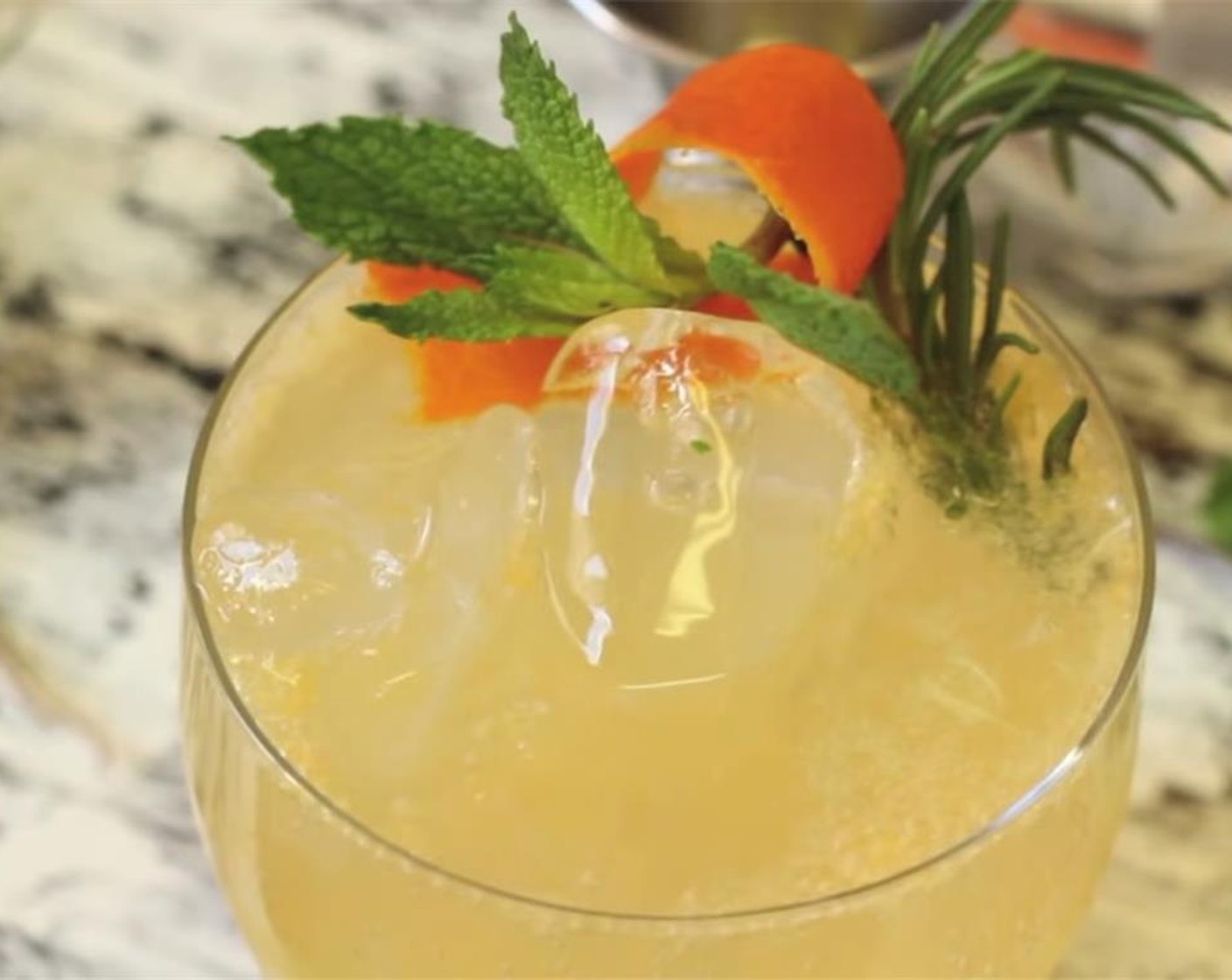 step 5 Garnish with a tangerine twist and rosemary sprig. Serve, and enjoy!
