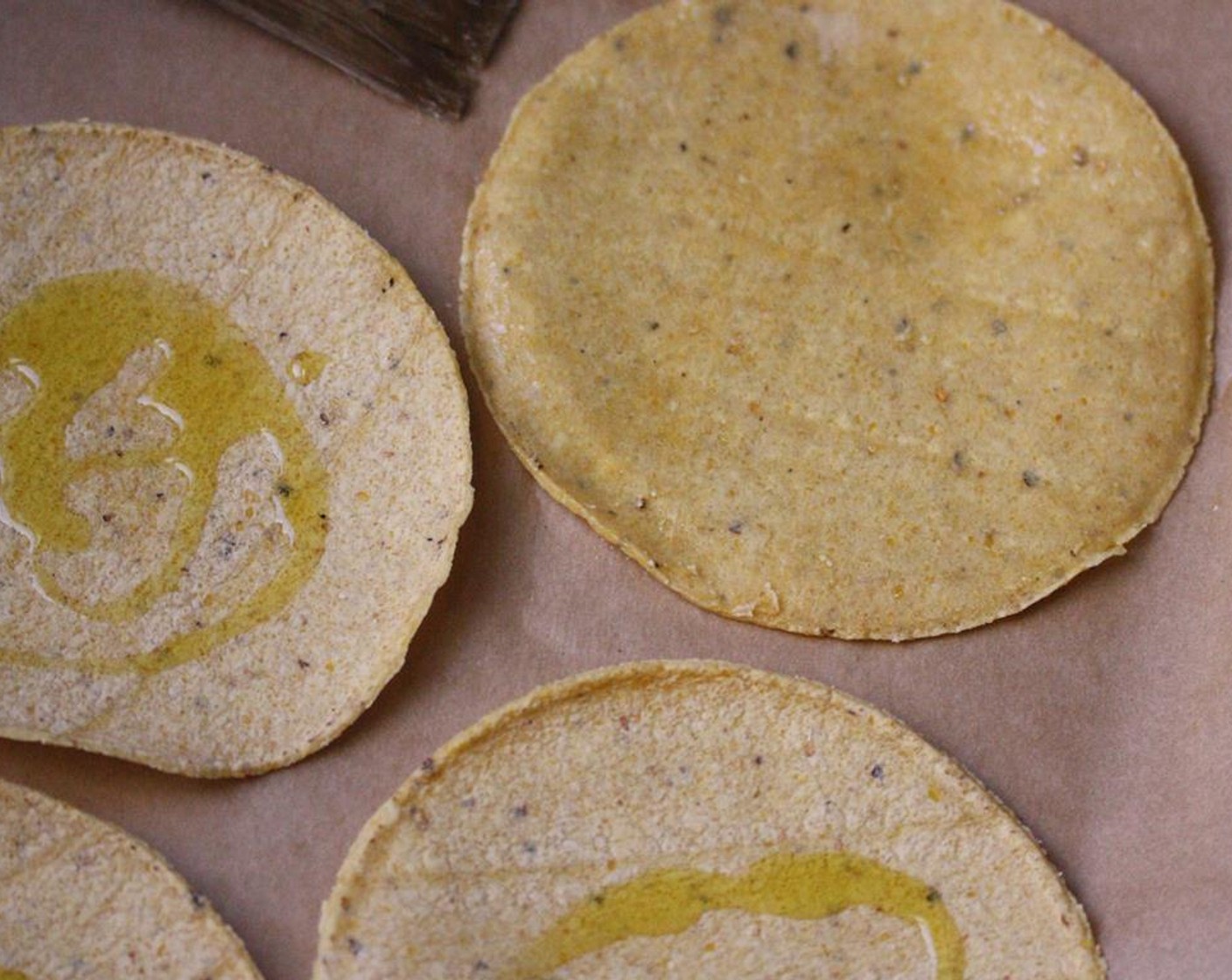 step 2 On a clean work surface, brush each Yellow Corn Tortillas (6) on both sides with Olive Oil (as needed).