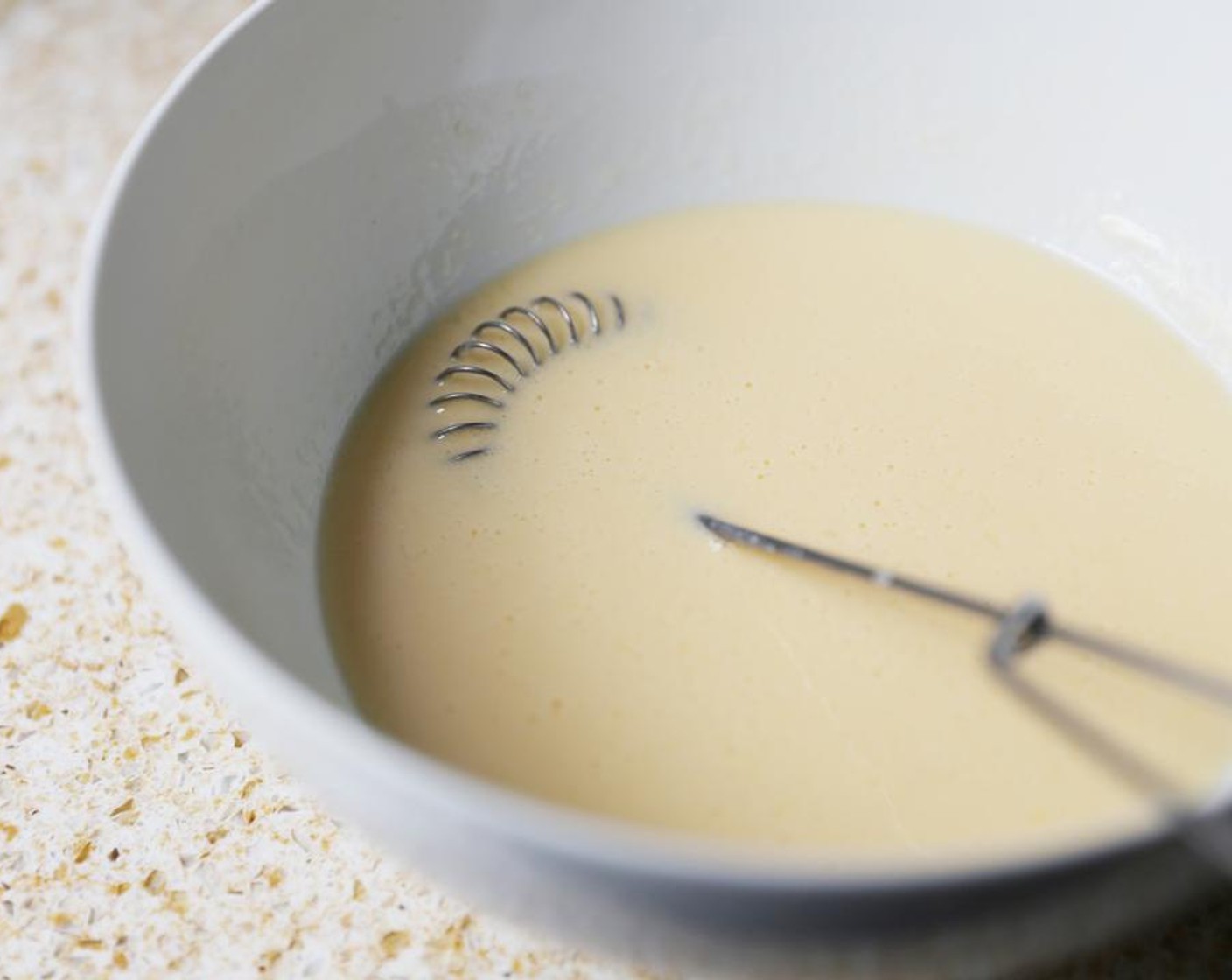 step 2 Combine the Eggs (2), Buttermilk (1/2 cup) and Milk (1/2 cup) in a bowl and beat until well mixed. Reserve 2 tablespoons of the mixture to use later.