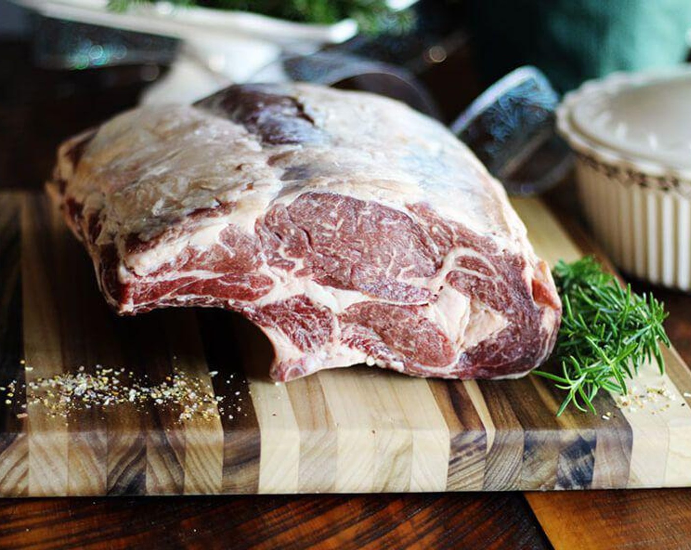 step 2 Sit the Standing Rib Roast (8 lb) onto a rack in a shallow pan. Be sure the rib side is down, fat side up.