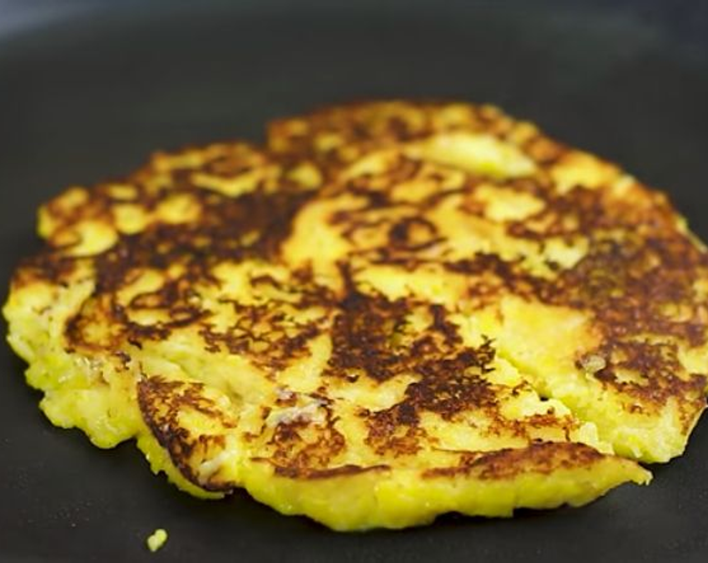 step 4 You'll start to notice bubbles forming on the surface, that's when its time to flip. Cook for 3 more minutes.