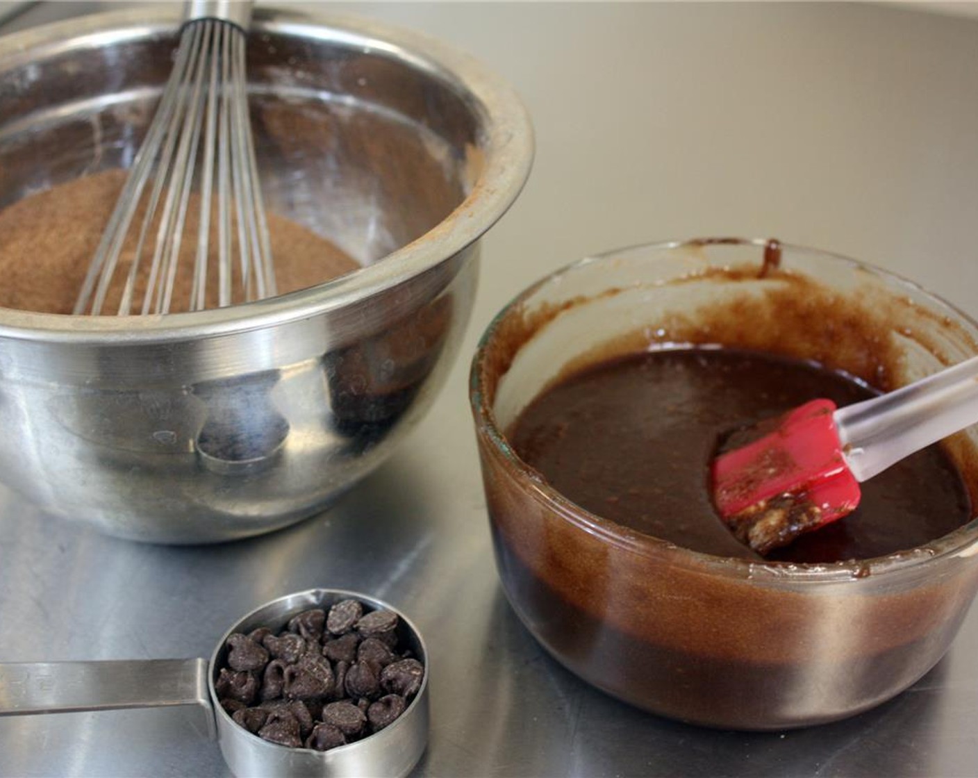 step 8 Stir the Granulated Sugar (1 cup) into the melted chocolate mixture, followed by the Rice Milk (1/4 cup), Vanilla Extract (1 tsp), and flax mixture. Whisk well to combine.