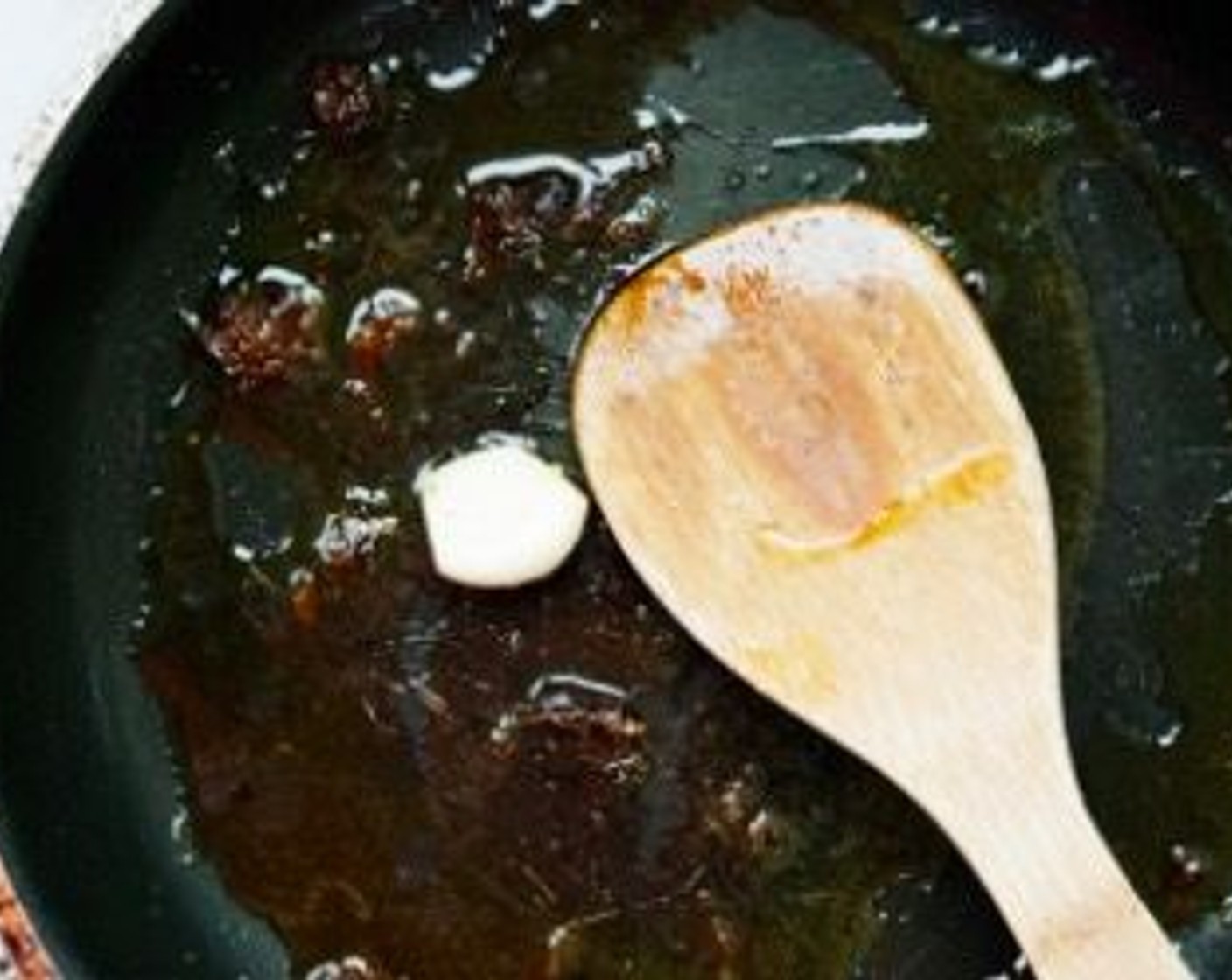 step 4 In a skillet, sauté the Garlic (1 clove) with Extra-Virgin Olive Oil (2 Tbsp). Add the Anchovy Fillets (2) and let them melt in the hot oil on low heat. Squeeze in the juice from the other half of the Lemon (1/2).