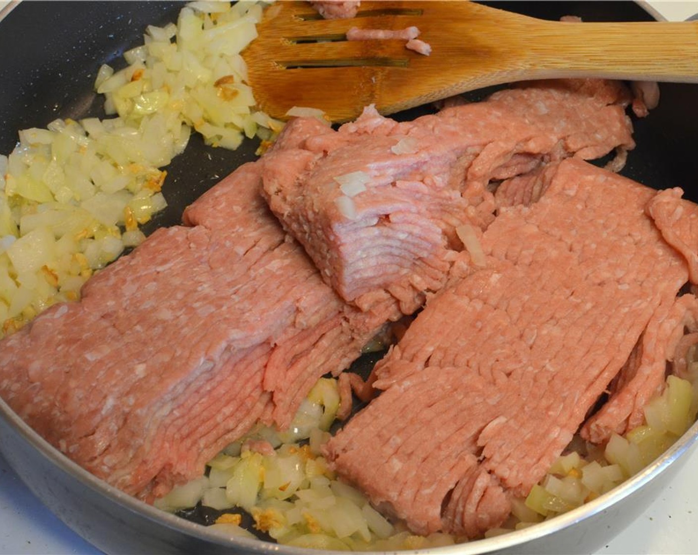 step 3 Add the Ground Turkey (8 oz) and stir to break up the meat.