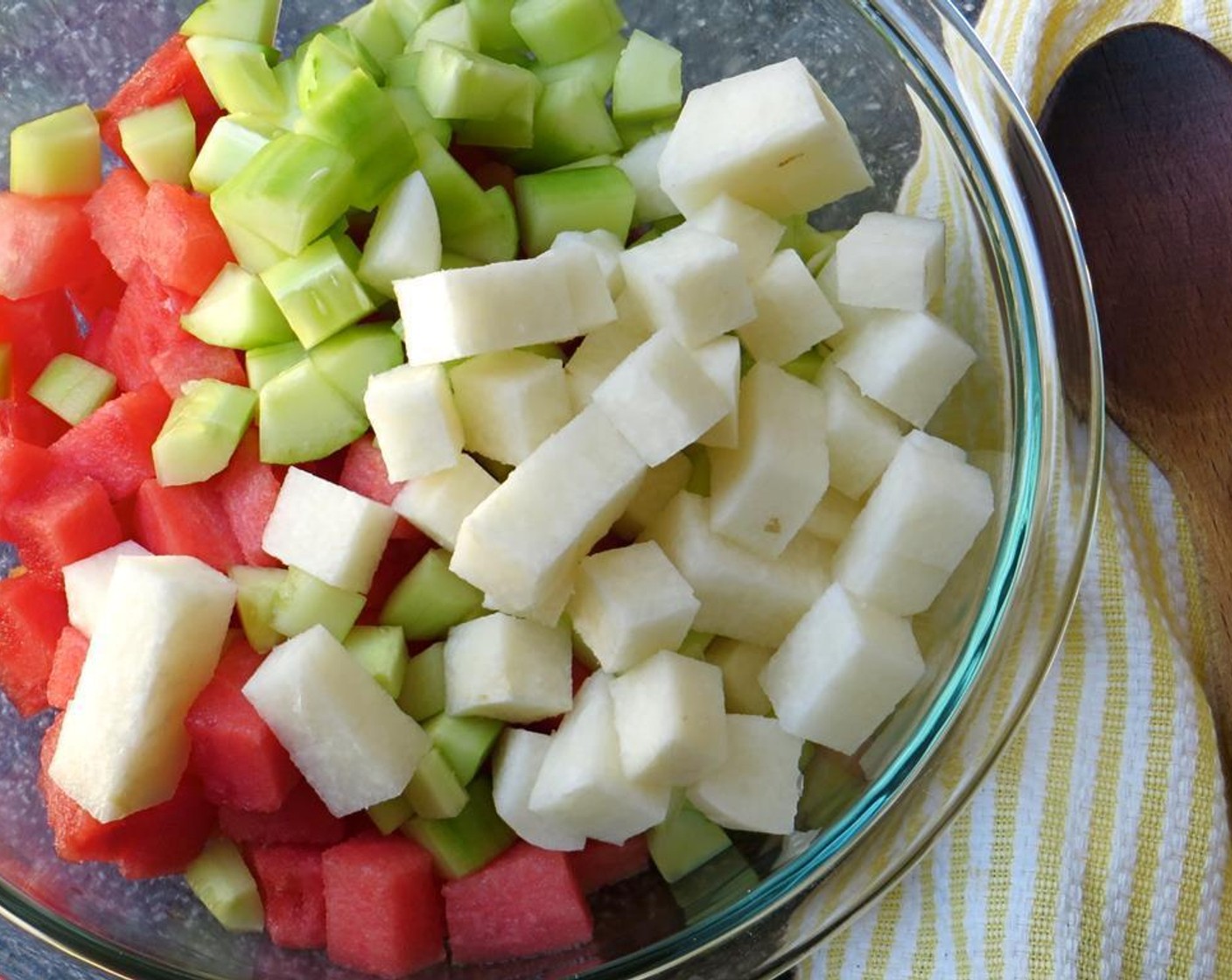 step 4 Peel and cut the Jicama (1) into a half-inch dice, and add to the bowl.