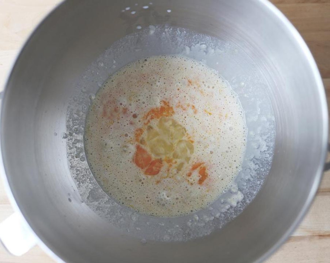 step 5 Add the whole Eggland's Best Classic Egg (1) and egg yolk, Honey (2 Tbsp), Salt (1 tsp) and remaining Granulated Sugar (2 Tbsp). Stir gently to just combine.