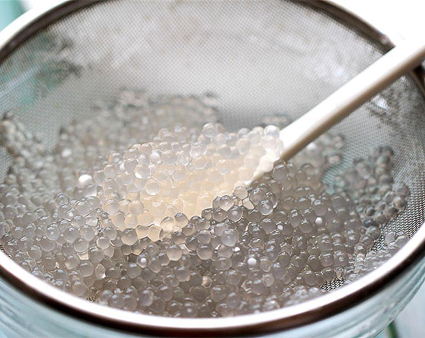 step 2 Move the pot from fire, set aside for around 15 minutes with the lid covered. Drain sago and rinse well under cold water.