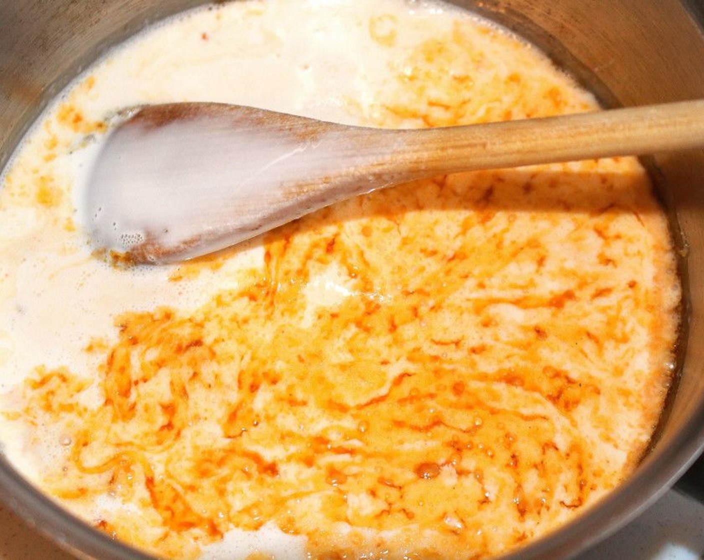 step 8 Add Heavy Cream (1 cup) and simmer until smooth.