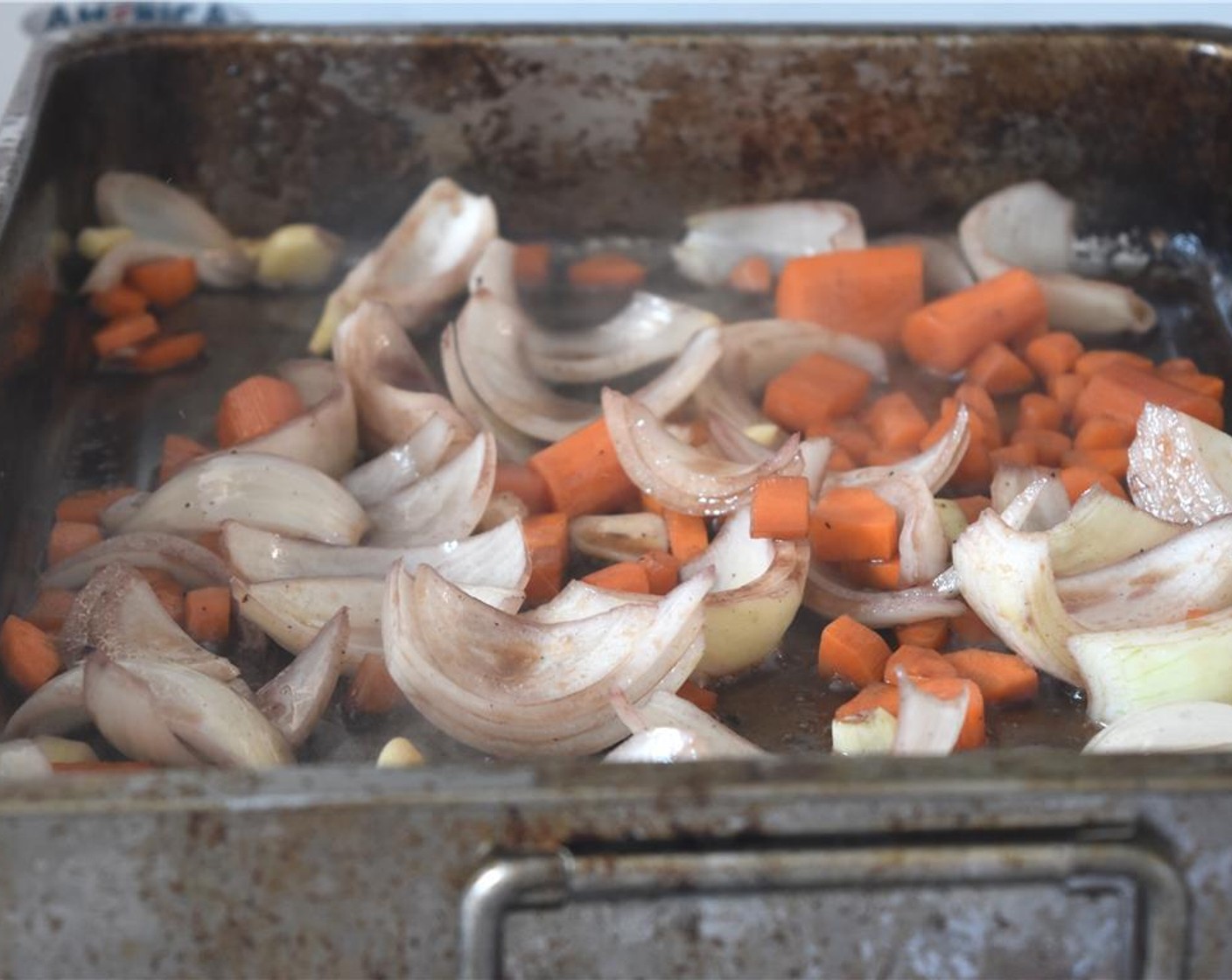 step 9 Add the carrots and garlic into the pan and saute for another 5 minutes.