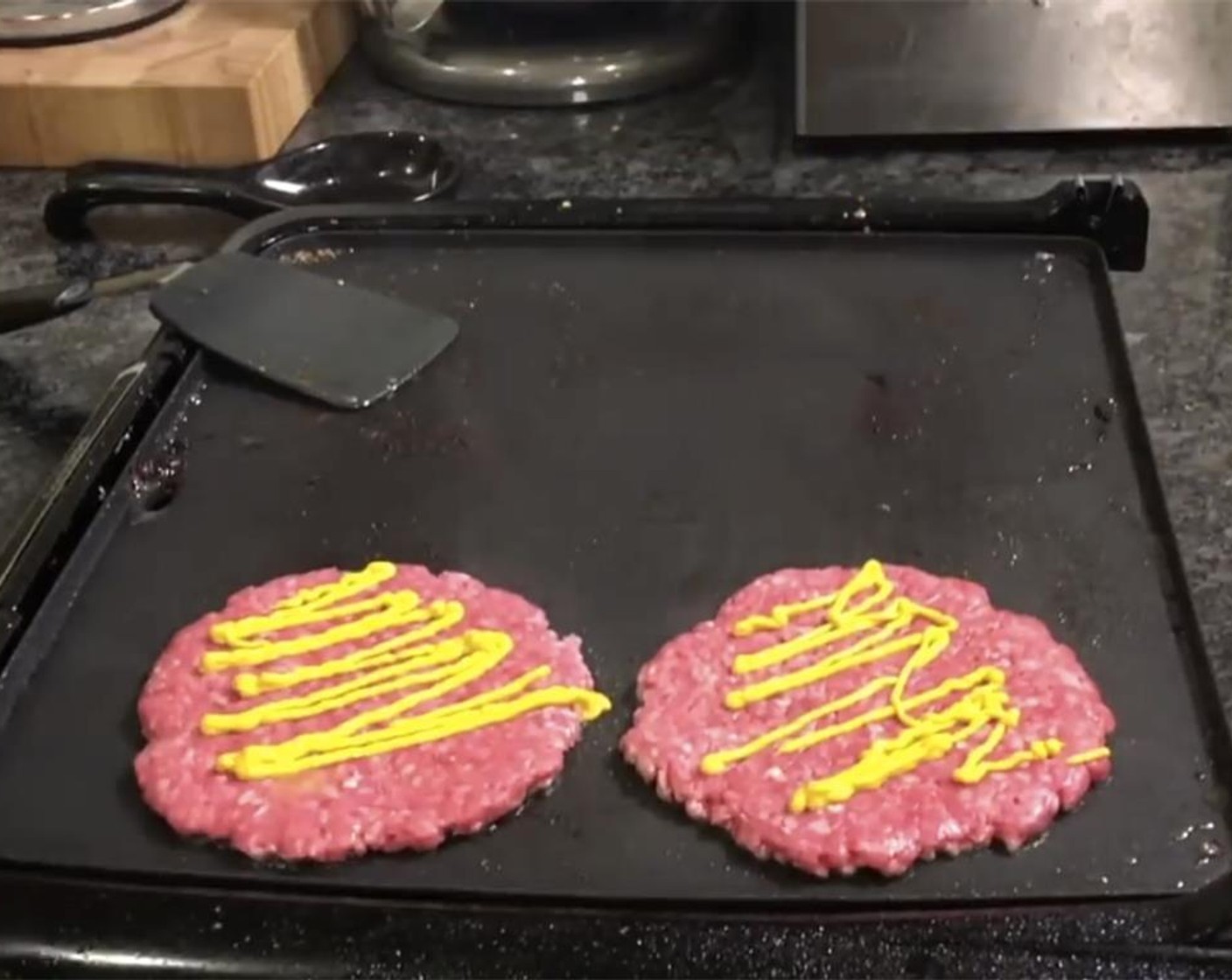 step 4 Place the patties on a hot grill or stove pan, add Yellow Mustard (to taste).