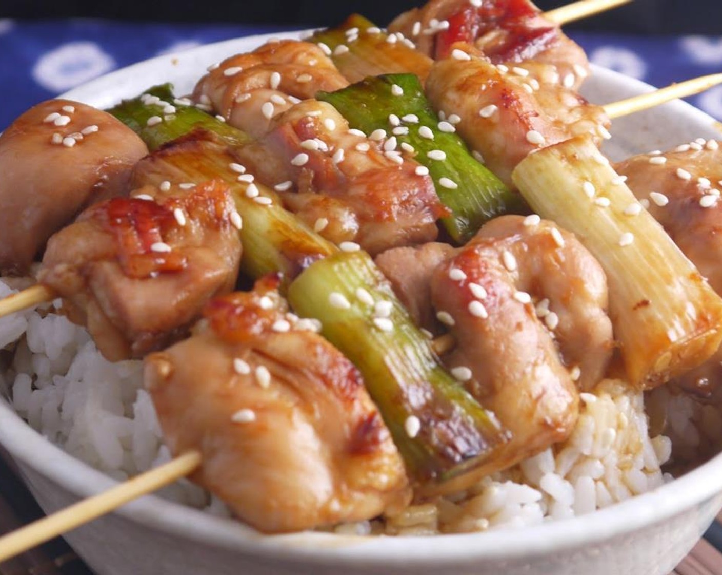 step 7 Arrange three skewers on top of a bowl of freshly cooked rice and serve immediately. Bon Appetite.