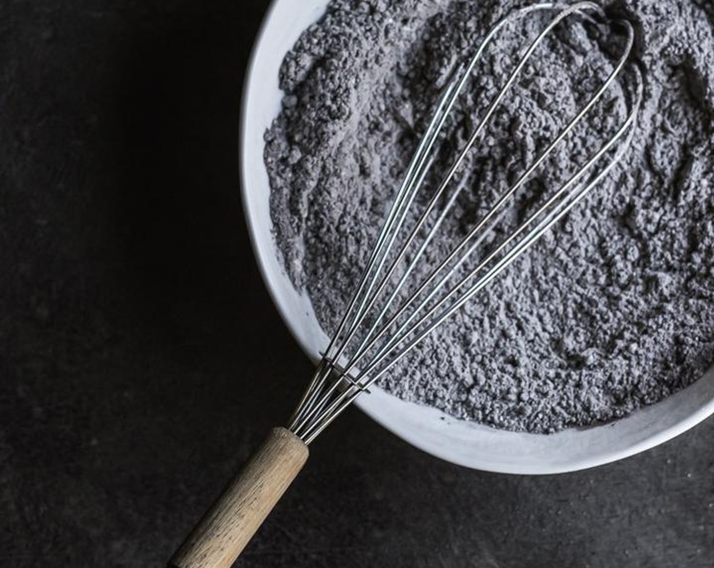 step 4 In the bowl of a stand mixer, beat the Eggs (2) and Granulated Sugar (1/2 cup) until light, add the Black Sesame Paste (1/3 cup) and continue to beat until well combined.