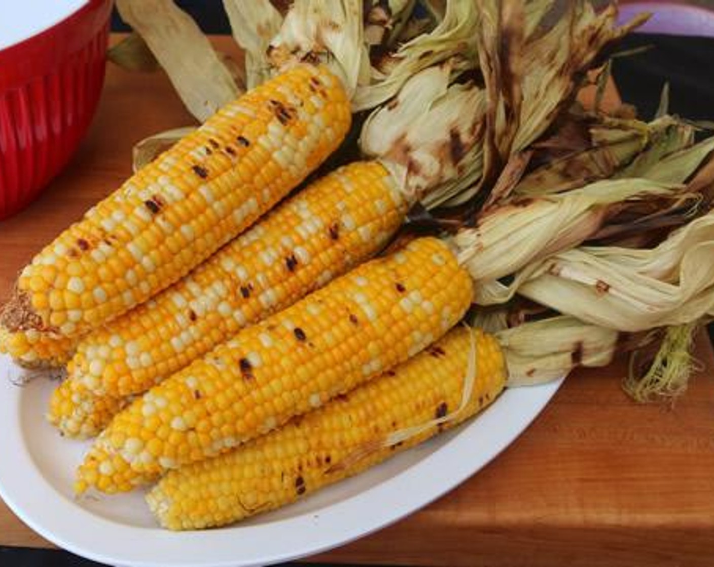 step 4 Remove husk end from each ear or corn and use a knife to cut off the corn into a large bowl.