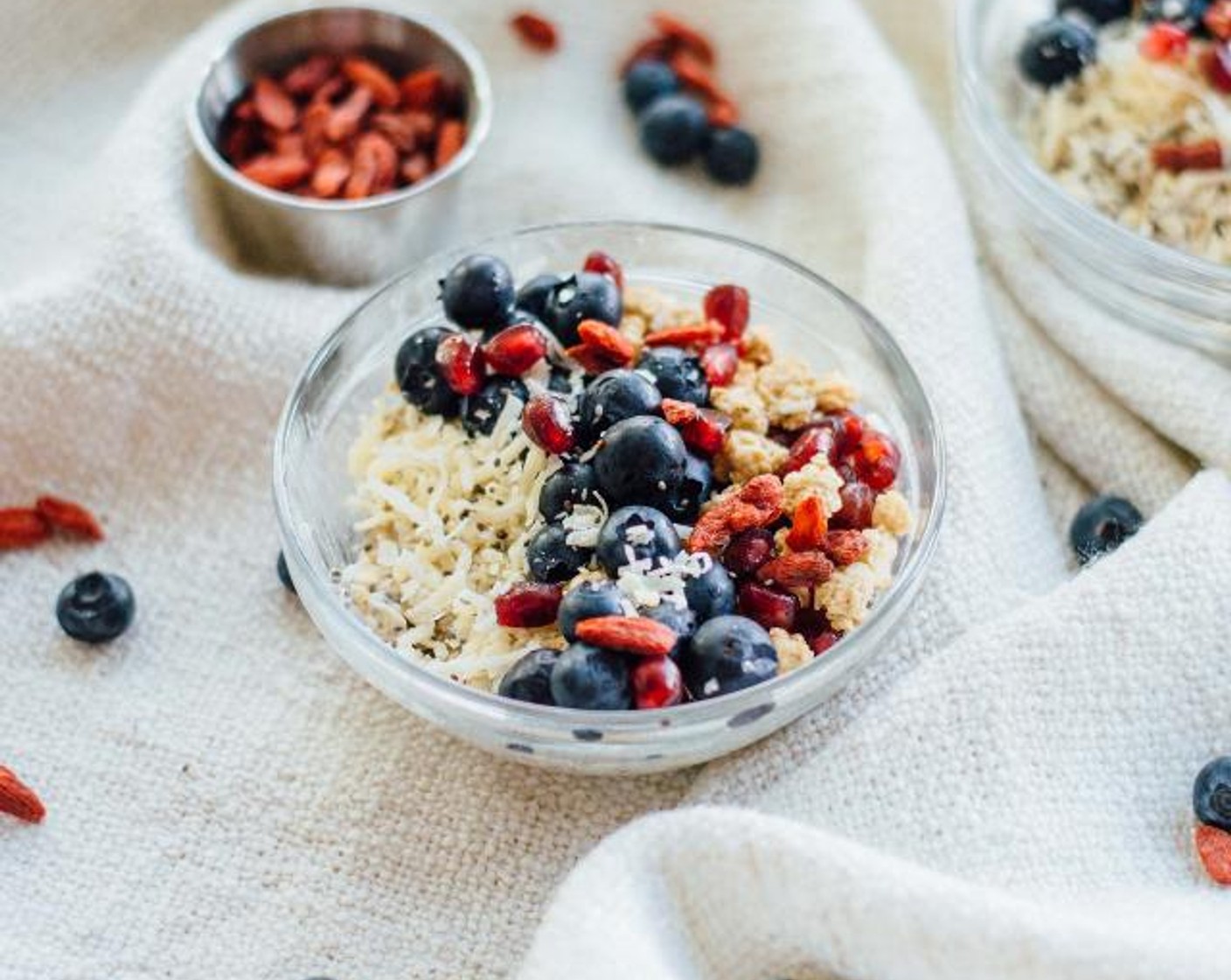 step 3 Take out, stir once or twice, and add Goji Berries (to taste), Pomegranate Seeds (to taste), Granola (to taste), Fresh Blueberries (to taste) and Unsweetened Shredded Coconut (to taste). Enjoy!