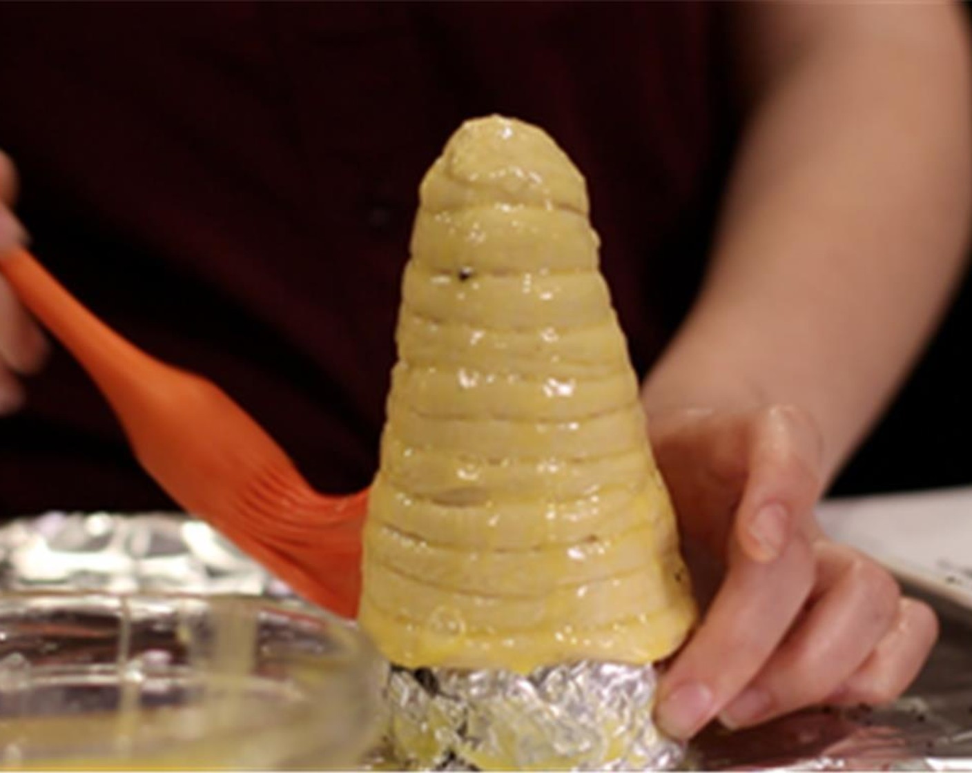 step 5 Brush it thoroughly with 1 beaten Eggland's Best Classic Egg (1) and roll it into the crumbled oreos.
