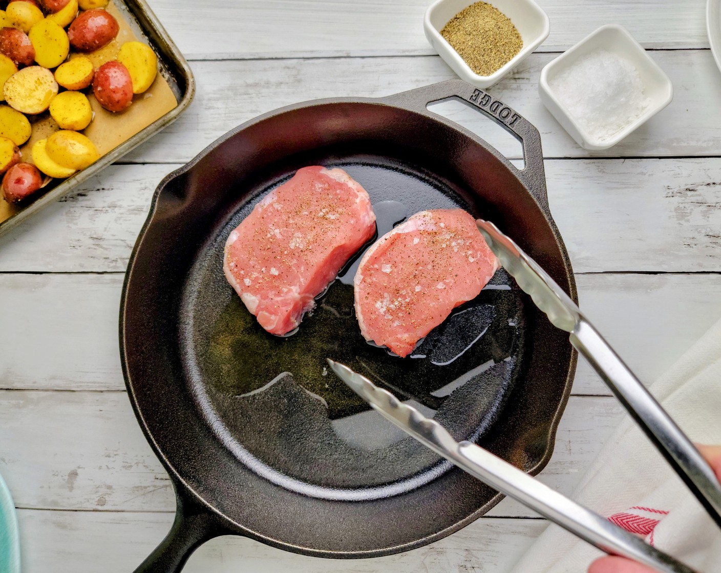 step 5 Heat the Olive Oil (2 Tbsp) over medium-high heat. Add the chops to the pan and cook for 3 to 4 minutes on each side.