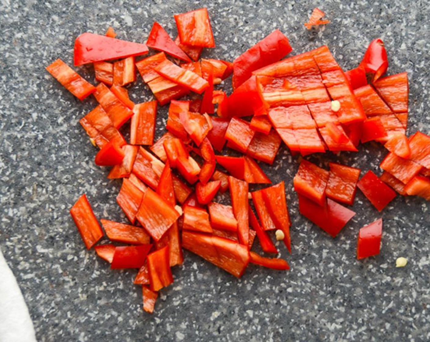 step 4 Seed and coarsely chop the Red Chili Peppers (2). Coarsely chop the Yellow Onion (1/4) and Garlic (3 cloves).