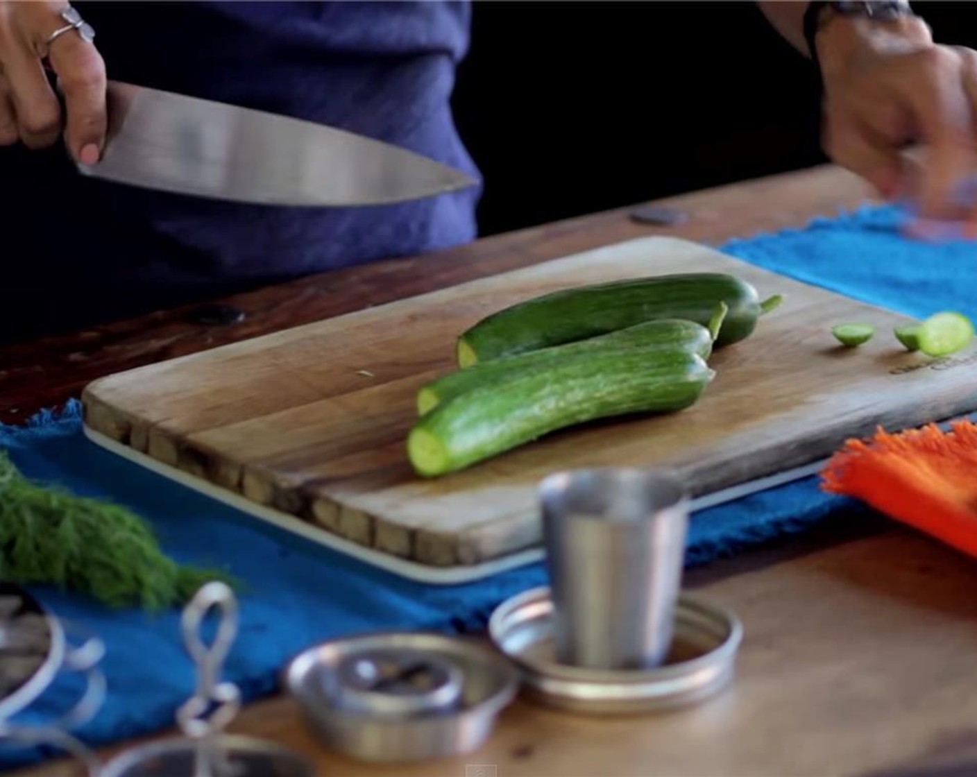 step 2 Trim off  1⁄4 inch  (6 mm) from the blossom end of the Kirby Cucumbers (6).