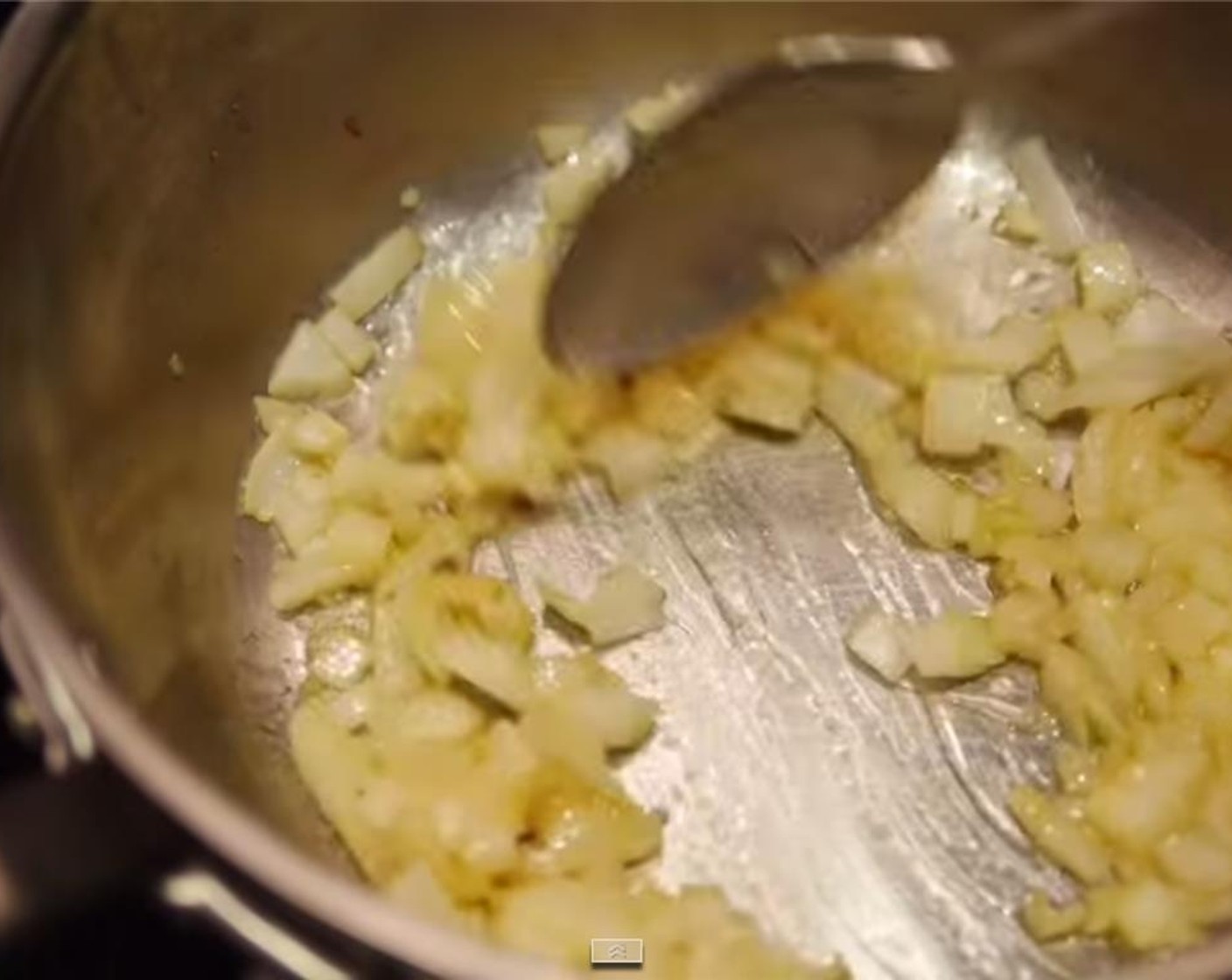 step 3 Add the onion to the pot. Season with a bit of salt and cook for 2 minutes.