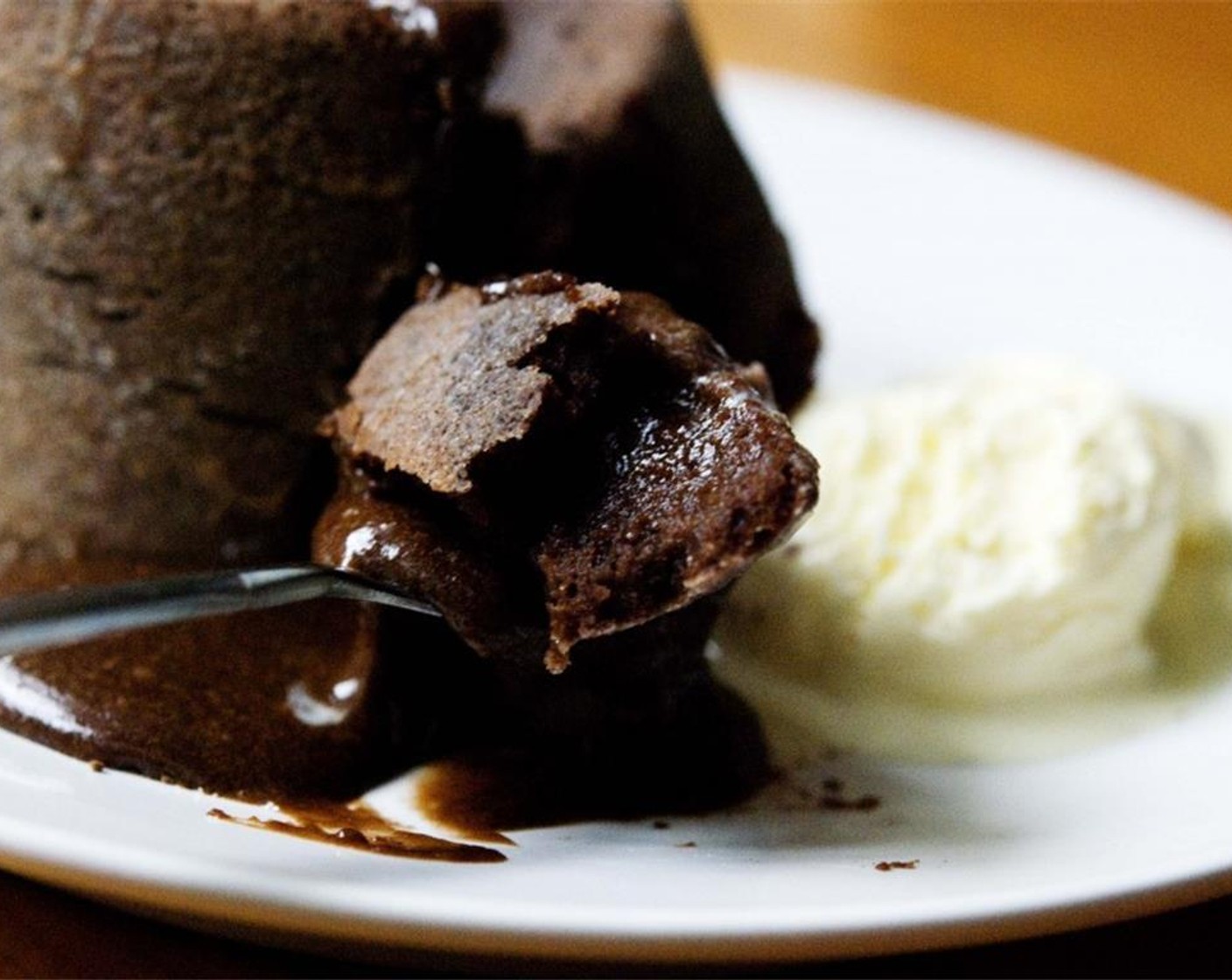 step 8 Let stand for 1 minute, then turn onto plates. Dust with Unsweetened Cocoa Powder (to taste) and pair with Vanilla Ice Cream (to taste). Enjoy!