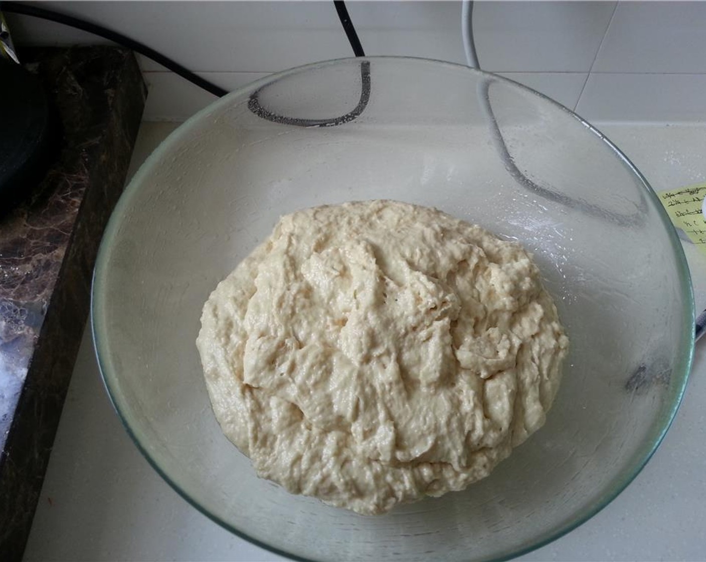 step 4 Remove dough from the bowl, place onto a lightly floured surface, and knead until smooth. Spray a large bowl with Nonstick Cooking Spray (as needed). Put the dough into the bowl.