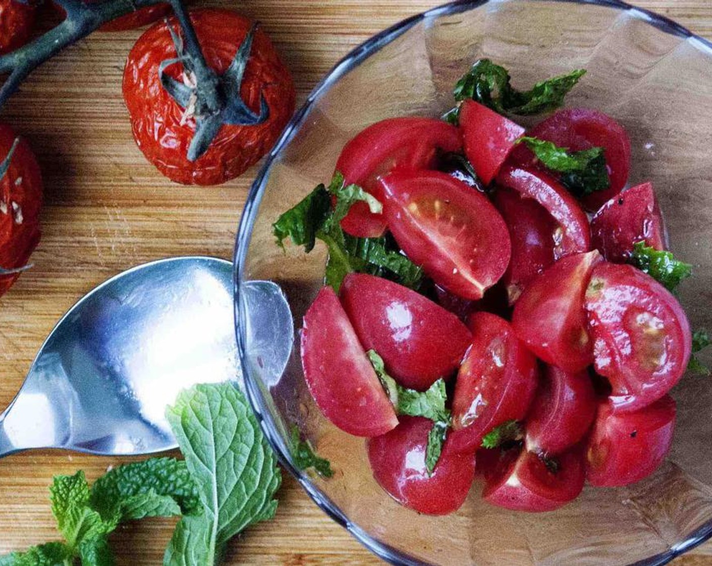 step 4 In a bowl, toss Heirloom Cherry Tomato (1 cup), Fresh Basil (4 Tbsp), and Fresh Mint Leaves (3 Tbsp) with Extra-Virgin Olive Oil (2 Tbsp), season with Salt (to taste) and Ground Black Pepper (to taste).