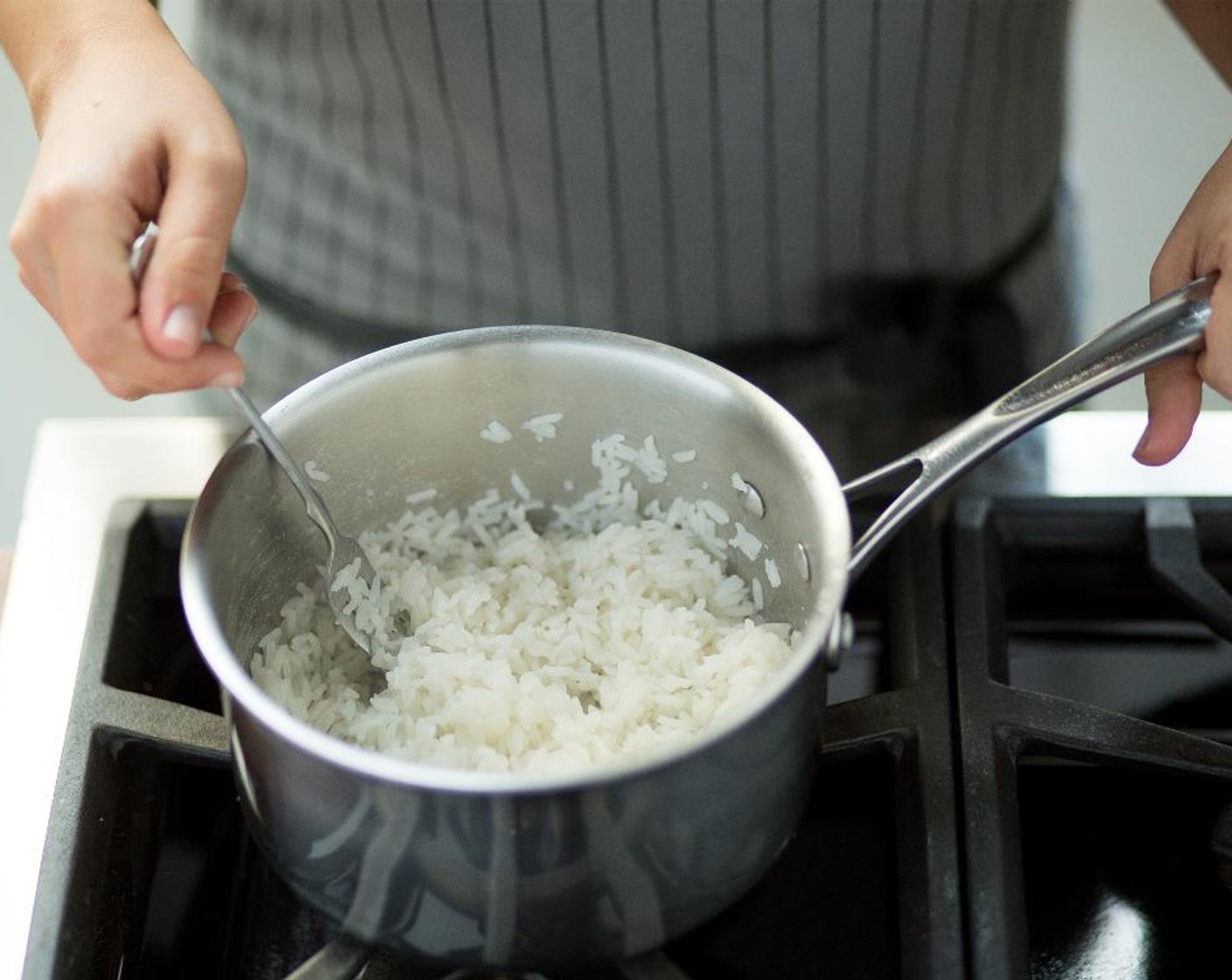 step 4 Combine Jasmine Rice (2/3 cup) and Water (1 cup) in a small saucepot over medium-high heat. When water comes to a boil, stir, cover, reduce the heat to low and simmer for 15 minutes. Fluff rice with a fork and keep warm for plating.