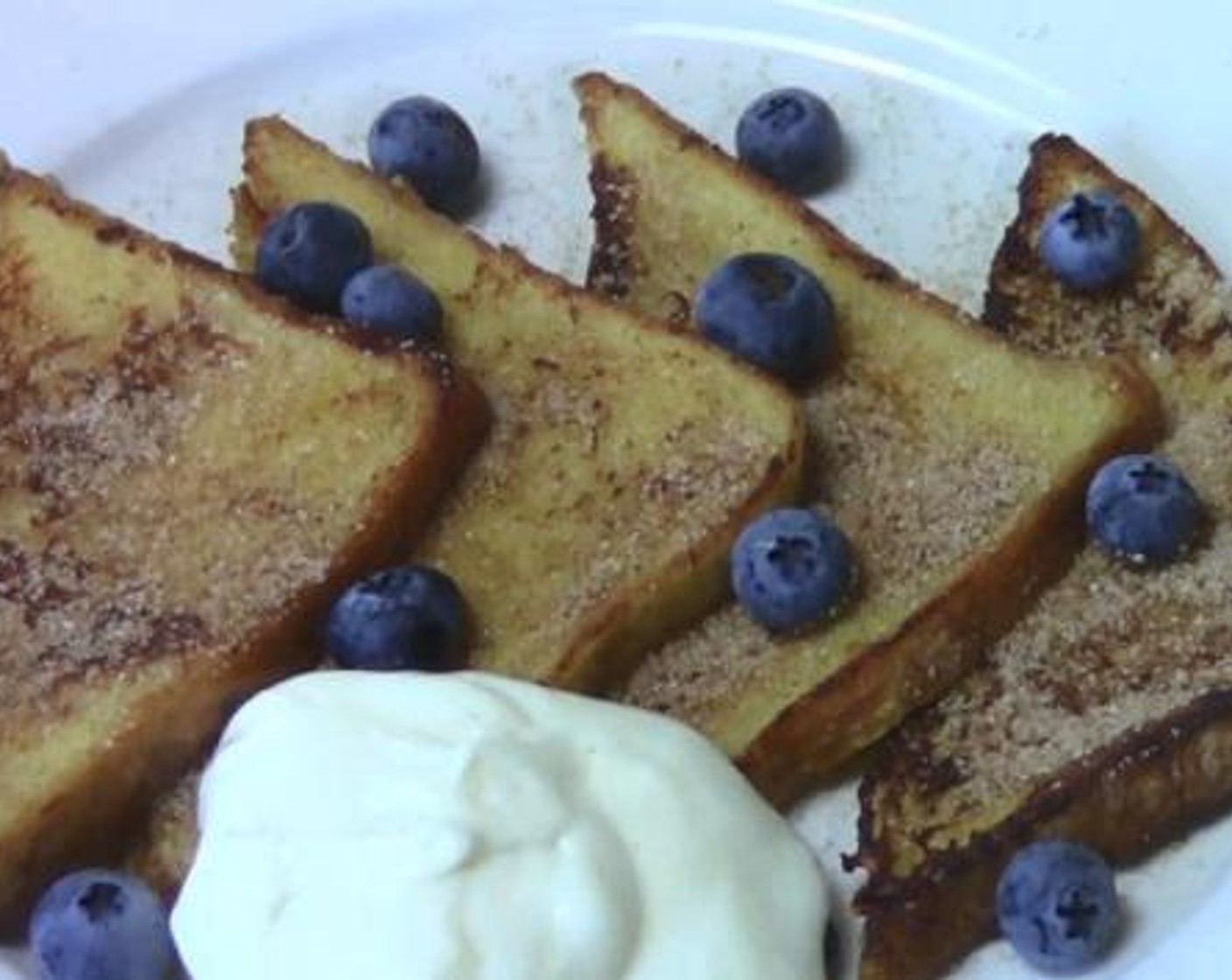 step 5 Sprinkle toasts with the cinnamon sugar, and serve with Fresh Blueberries (to taste) and Vanilla Yogurt (to taste)!