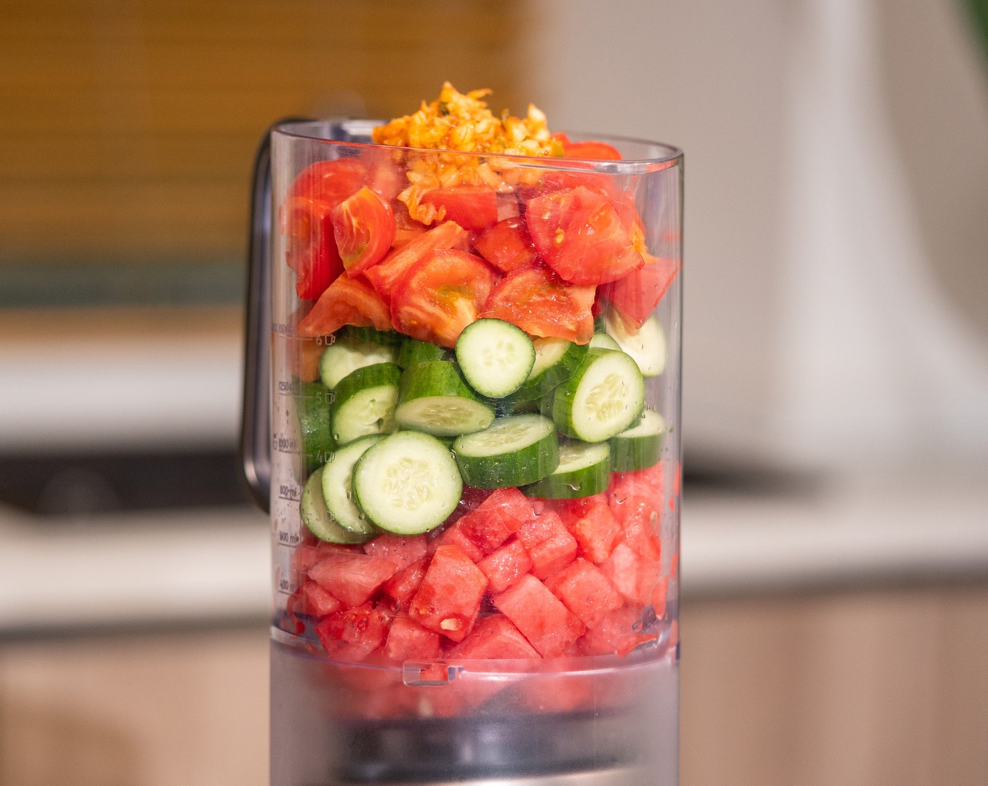 step 1 In a blender, add Watermelons (4 cups), Persian Cucumbers (4), Tomatoes (2), and Kimchi (1/2 cup). Blend until smooth.