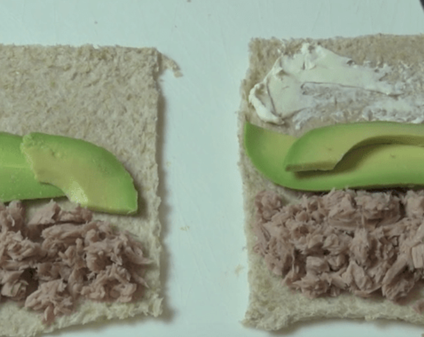 step 2 Divide the Canned Tuna (1/3 cup) over one third of each slice of bread. Next, add in some Avocado (1/2) and a little bit of Cream Cheese (1/4 cup). Make sure that you leave a little tiny gap at the edge.