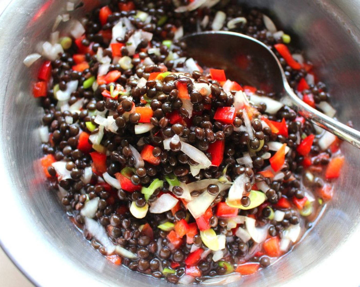 step 1 Mix Black Lentils (to taste), Onion (1), and Bell Pepper (1/2) with Honey Mustard Vinaigrette (1/4 cup).
