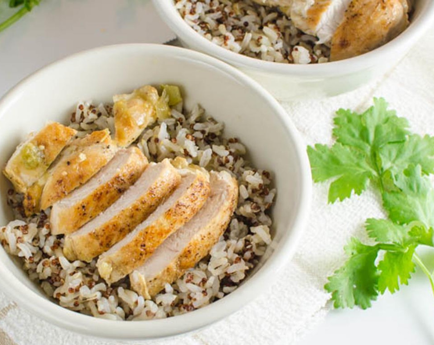 step 10 Slice the organic chicken breasts into 1/2" strips and place on top the the quinoa.