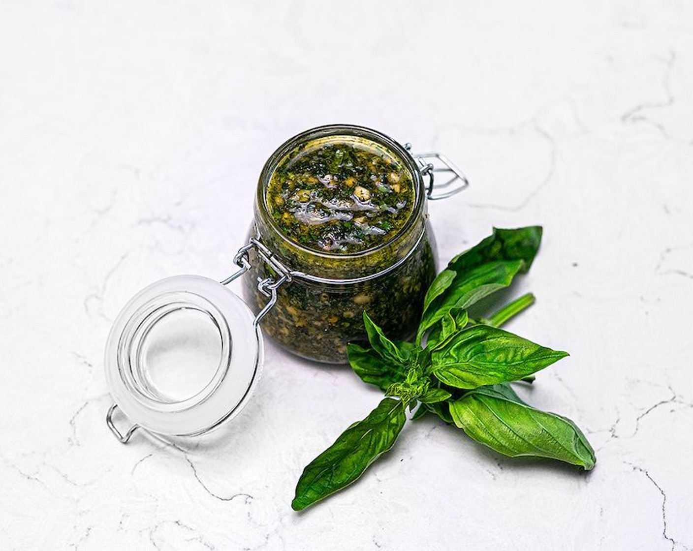 step 5 Store Pesto Alla Genovese in an airtight container. Before you seal it, cover the top of the pesto with a layer of oil to help preserve its freshness.