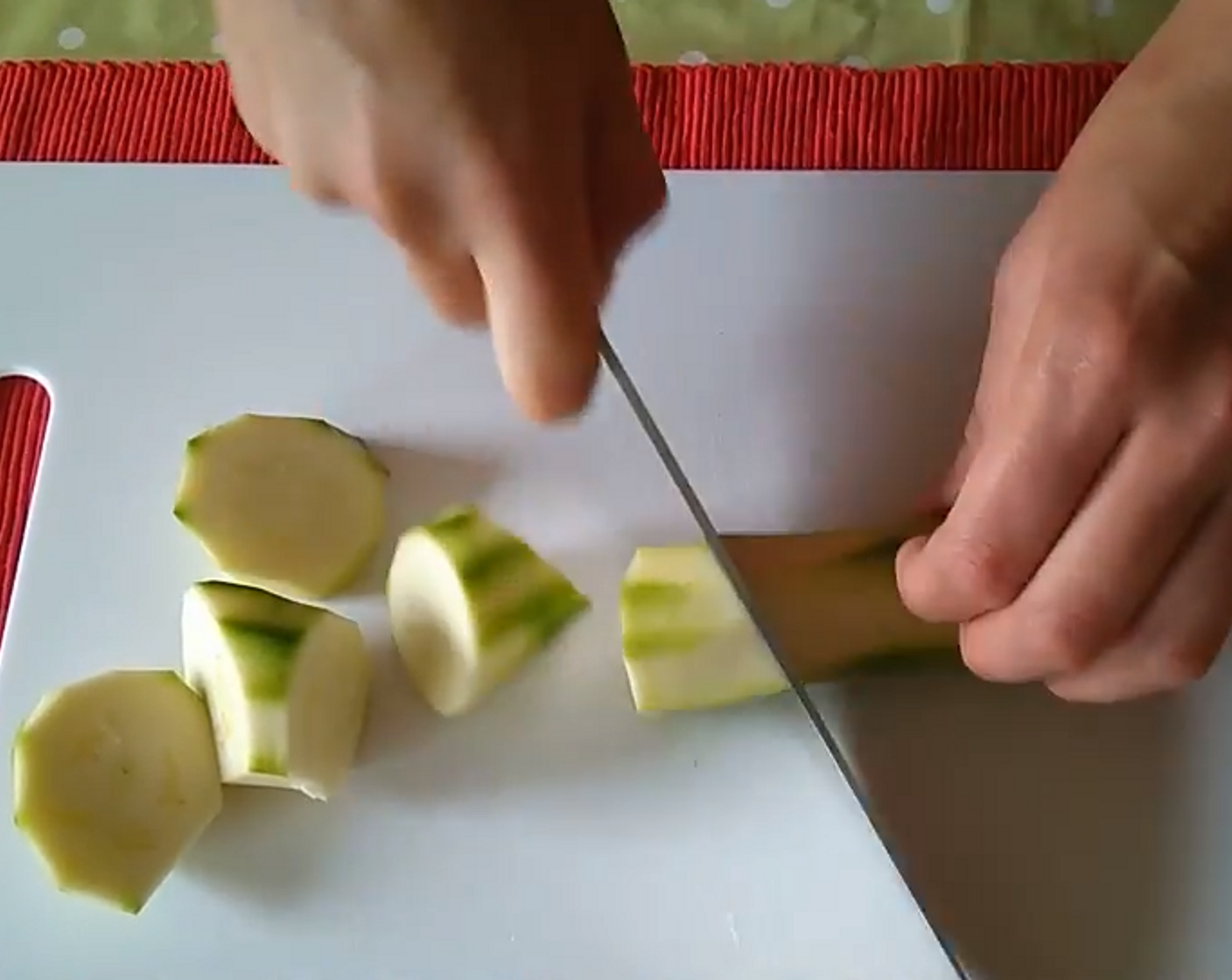 step 1 Peel the Garlic (1 clove), the Onion (1), Zucchini (3), and Potatoes (4). Chop them into medium-sized pieces.