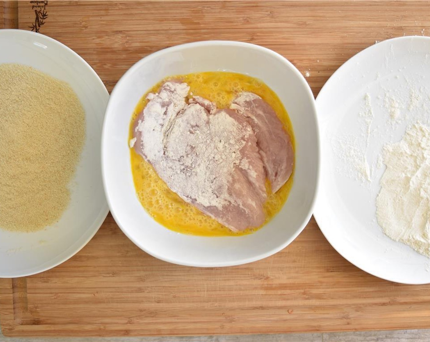 step 6 Make your breading station. One bowl for All-Purpose Flour (as needed), one bowl for beaten Eggs (as needed), and one bowl for Breadcrumbs (as needed). Coat chicken breasts in that order.