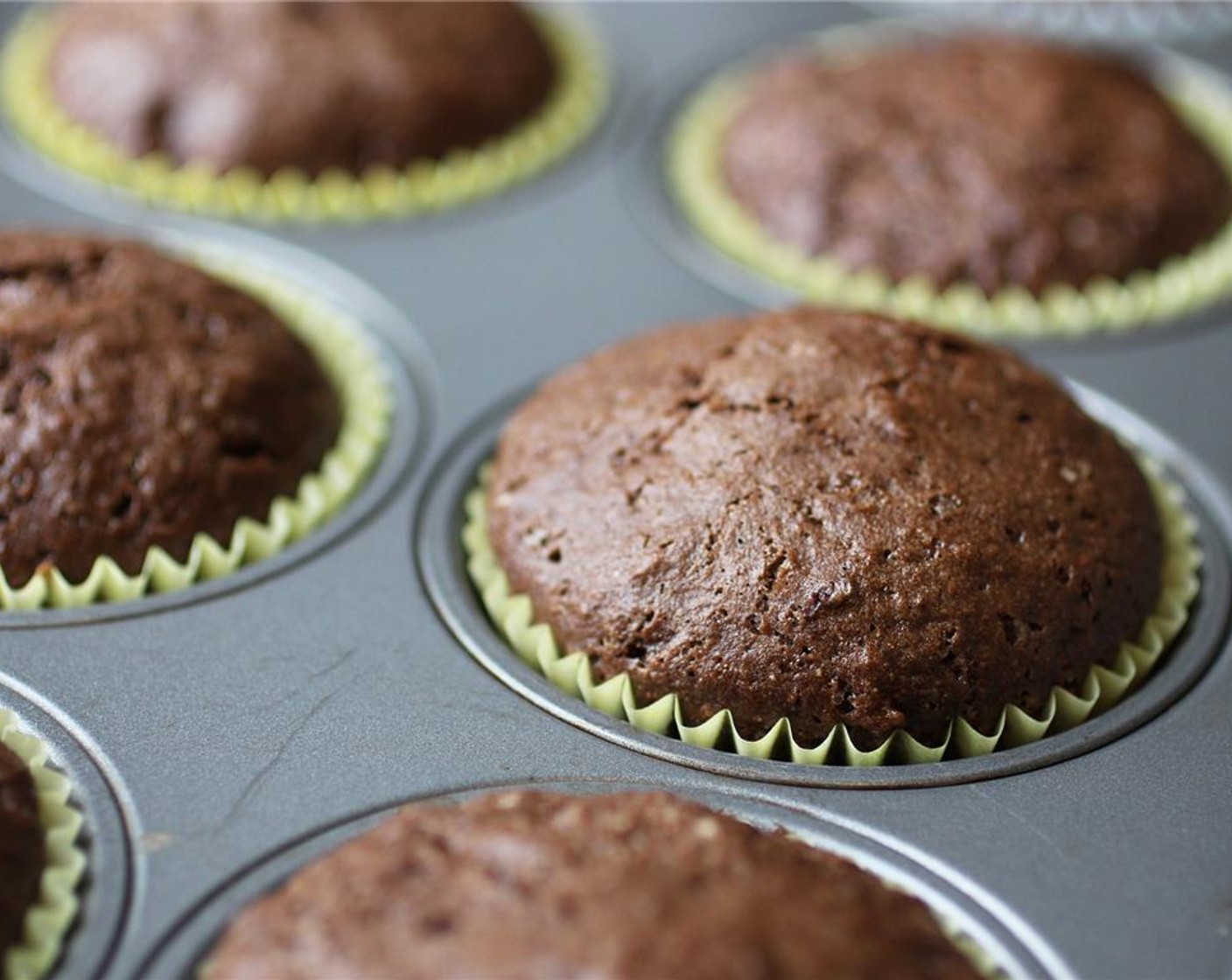 step 6 Bake for about 18 minutes, or until a toothpick inserted into the center of the cake comes out clean with just a few crumbles of cake on it. Set cakes aside, and let them cool completely before frosting.