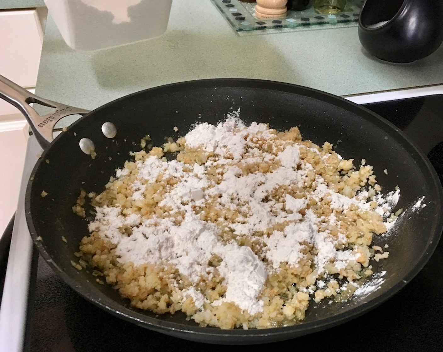 step 10 Sprinkle All-Purpose Flour (1/3 cup) over shrimp mixture and stir until evenly coated. Keep stirring for about 2–3 minutes to fully cook and lightly toast the flour.