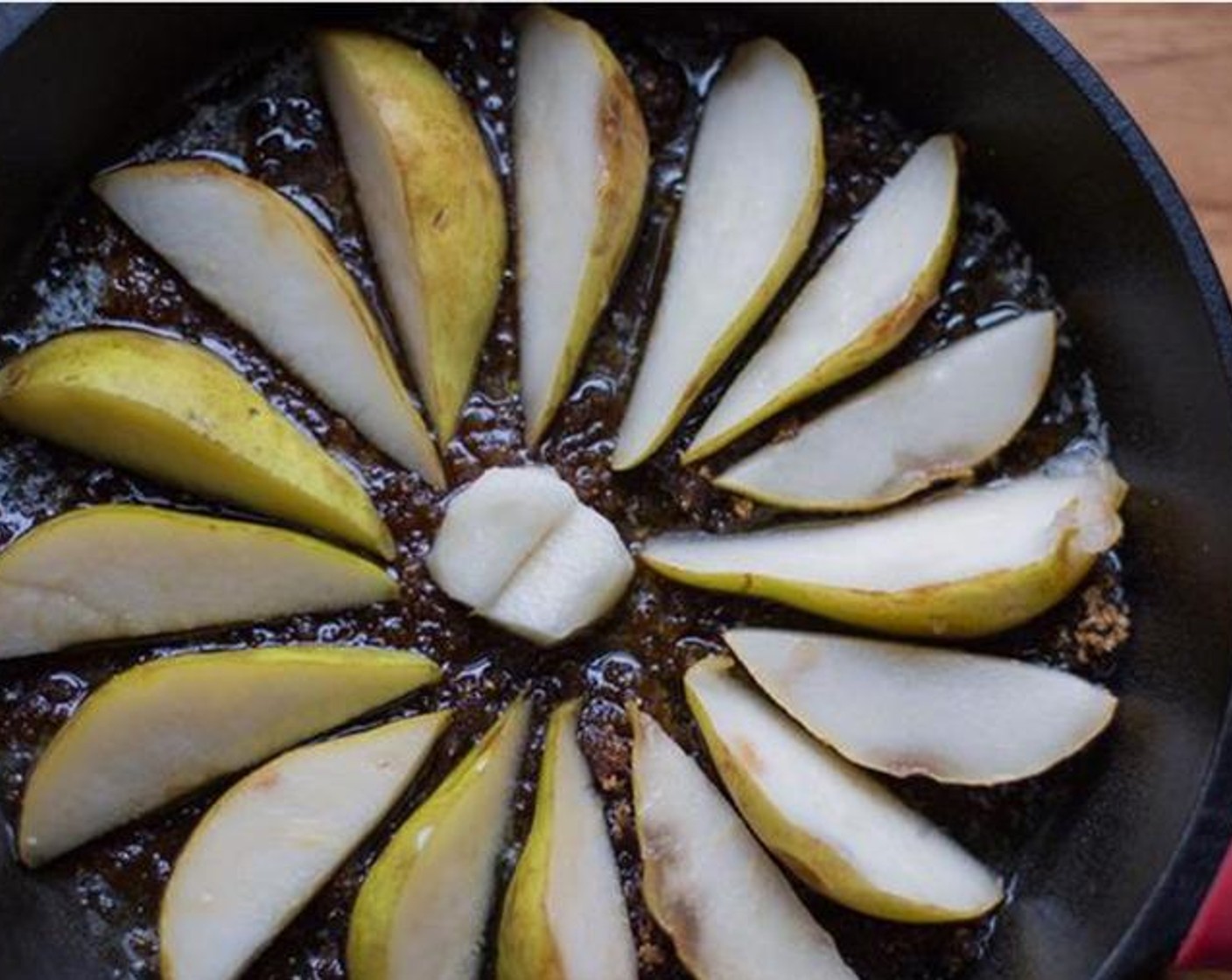 step 3 Arrange D'anjou Pears (4) on top in a pattern of your choice. Turn heat to low.