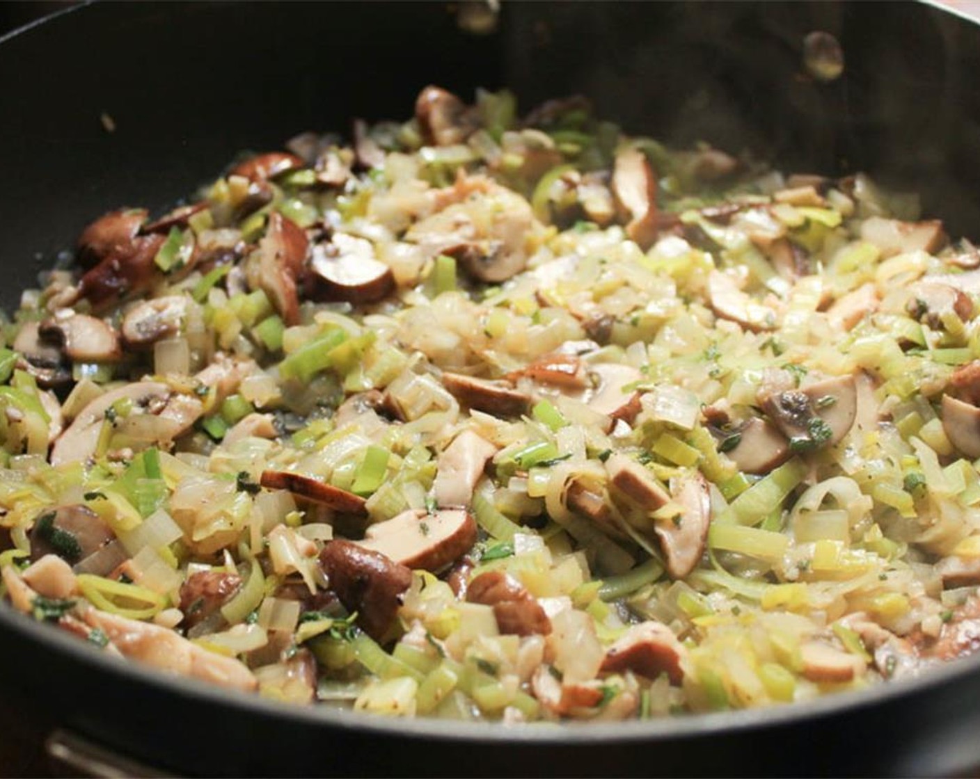 step 11 Add the mushrooms, thyme, and sage and cook for 8 minutes until the mushrooms have released their liquid and are tender.