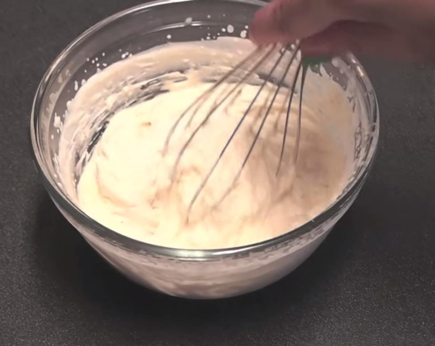 step 7 To make the whipped cream topping, whip together the Heavy Cream (1/4 cup) and 3 tablespoons of pumpkin spice syrup until it reaches stiff peaks.