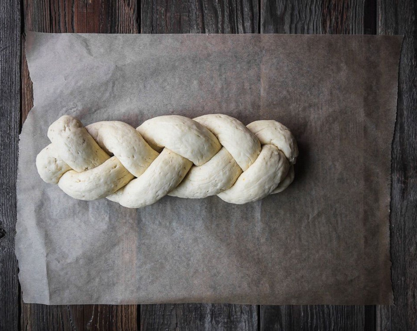 step 20 Cover the braided bread with oiled plastic wrap and allow to rise in a warm, draft-free location for 40 minutes.