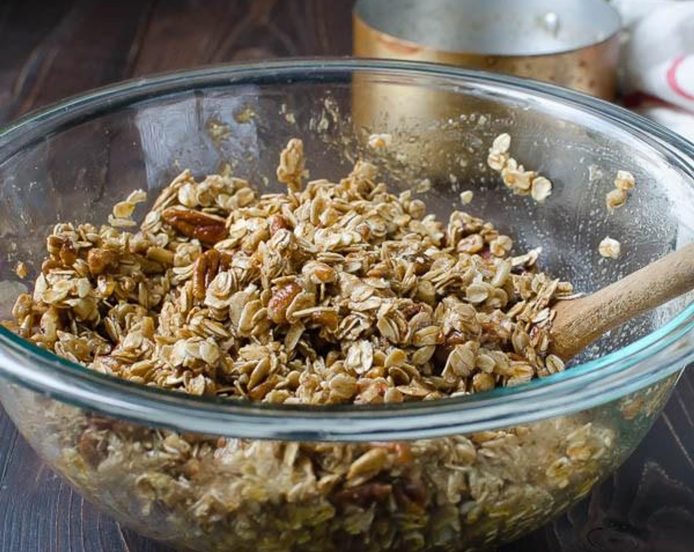 step 4 Divide the granola between the two sheet pans and spread into a single layer. Bake for 10 minutes, stir the granola, spread out into a single layer and bake for another 10 minutes, until golden and fragrant.
