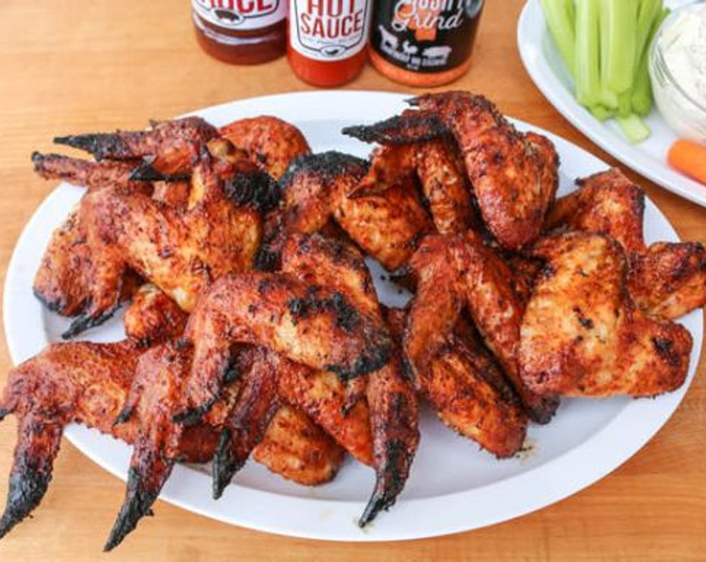 step 7 Toss the grilled wings in the sauce in batches (3-4 wings at a time). Serve and enjoy wings with your favorite dipping sauce, celery and carrot sticks.