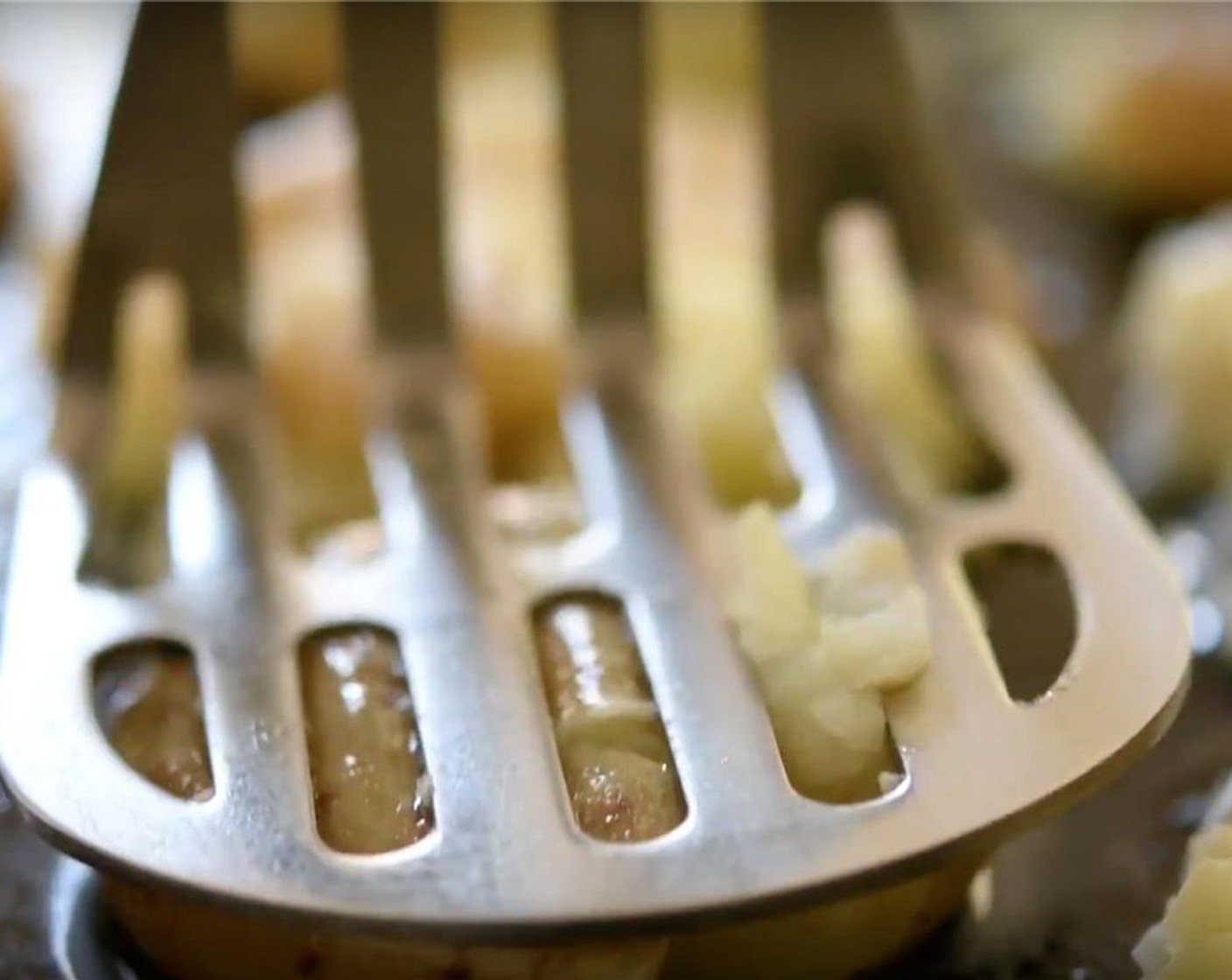 step 5 Mash gently with a potato-masher.